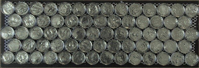 Metallic backed silver glass penny round tiles